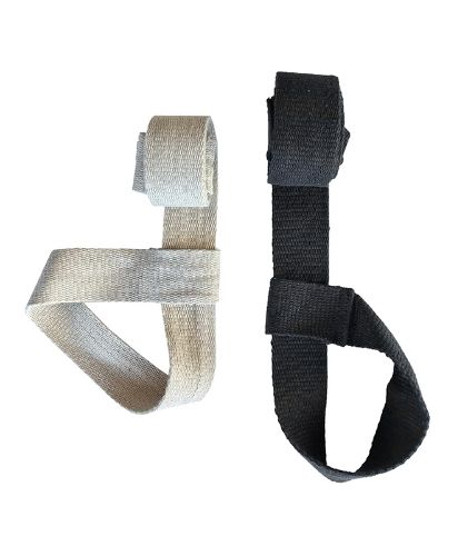 white hemp yoga strap folded up next to a folded black hemp yoga strap